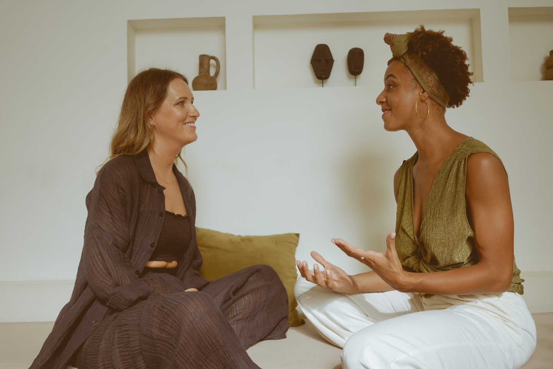 Chantelle in conversation with a client in a light, calm room